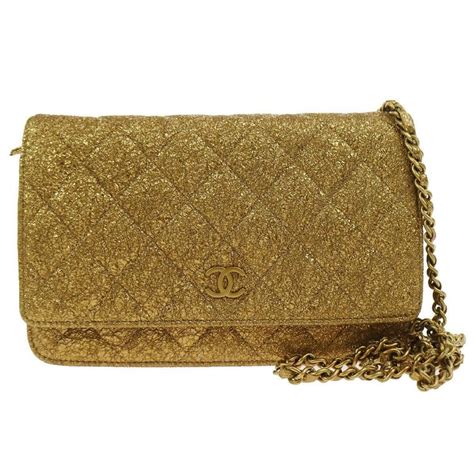 chanel gold clutch price|chanel clutch with hand strap.